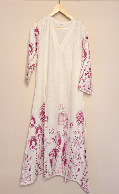 White khadi coordset with pink floral patterns on a hanger against a beige background