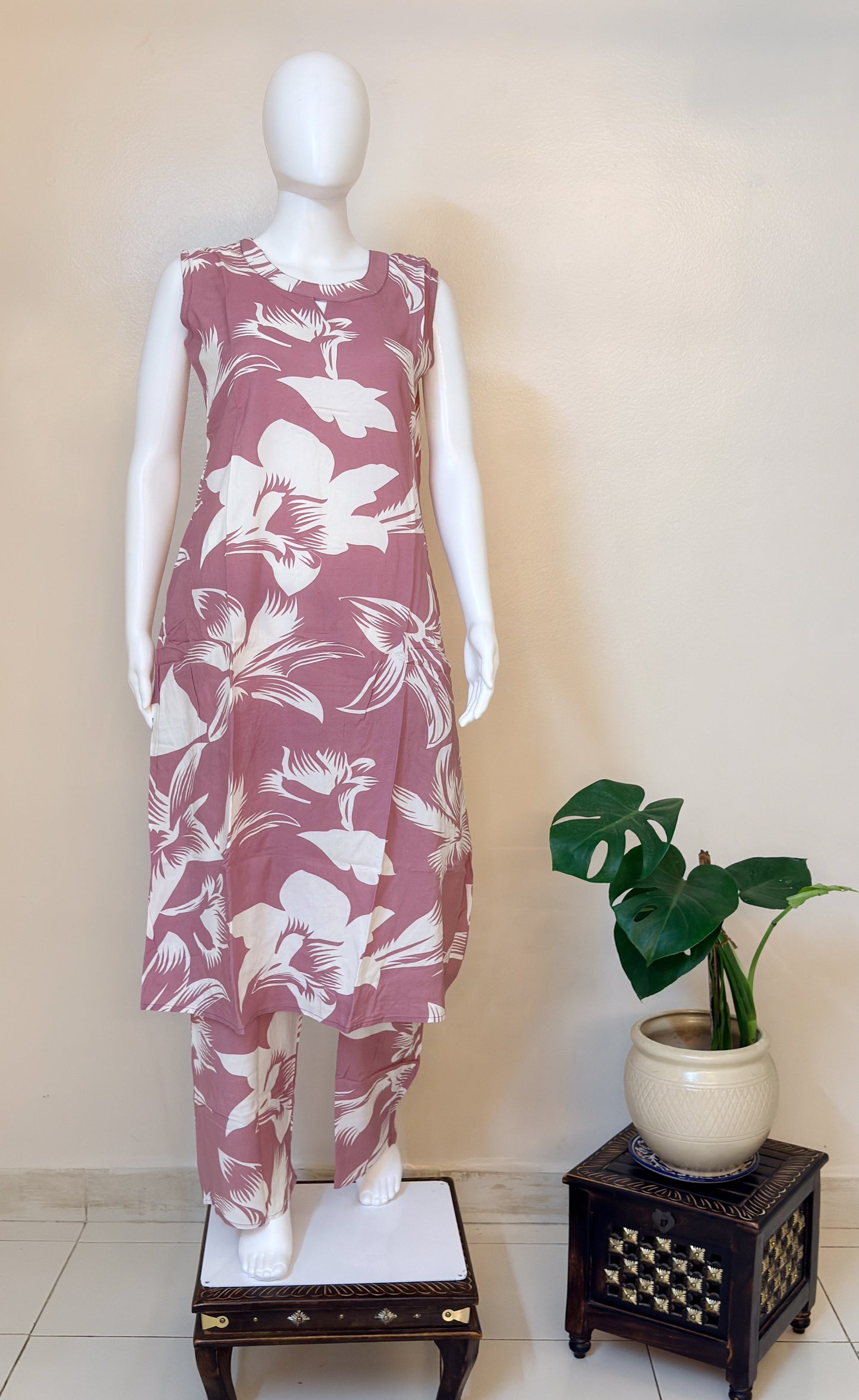 Mannequin wearing a dusty rose floral coordset.