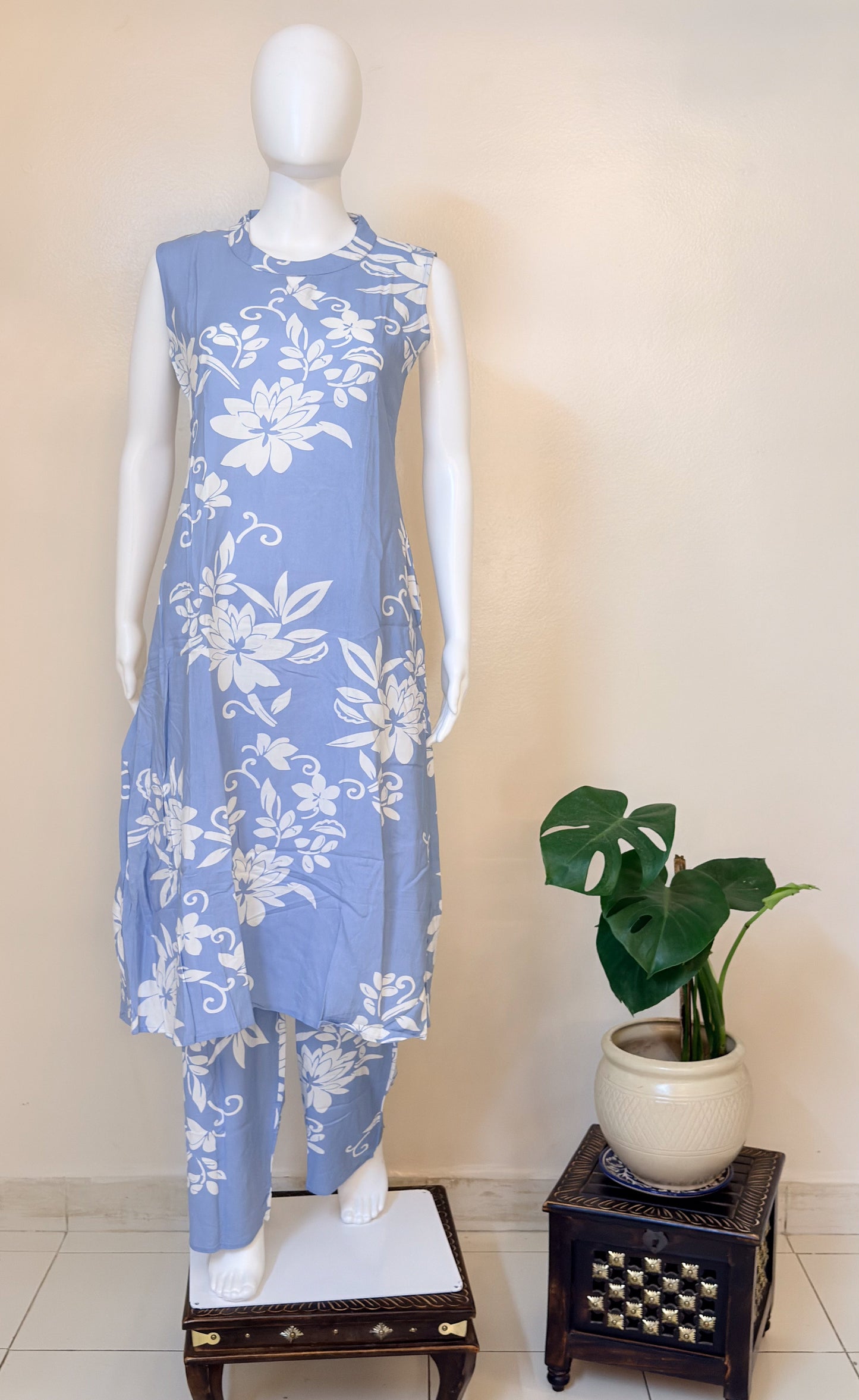 Mannequin wearing a light blue floral coordset.