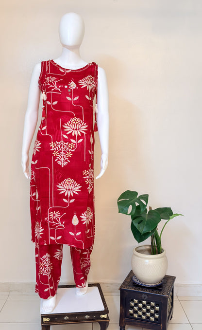 Pink Coordset with white floral pattern on a mannequin against a white background