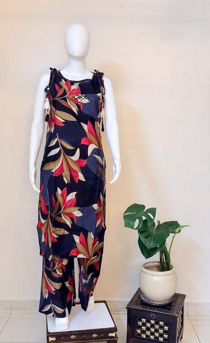 Mannequin wearing a colorful floral coordset.